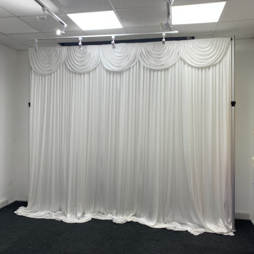 3m white detachable swag attached to wedding backdrop