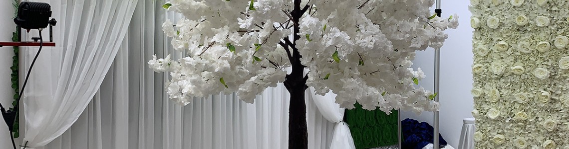 Why Artificial Trees Are Perfect for Decorating Wedding Backdrops